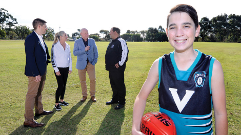 Mayor Tracey Roberts and Councillors Brett Treby and Domenic Zappa with Kingsway Junior Football Club Vice President Ryan Santich and son Lucas at Paloma Park in Marangaroo.