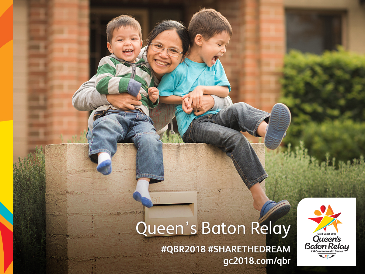 Family watching Queen's Baton Relay