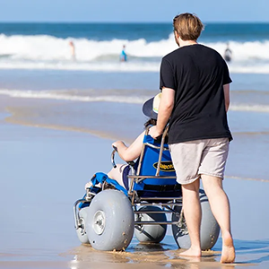 People using beach wheelchair
