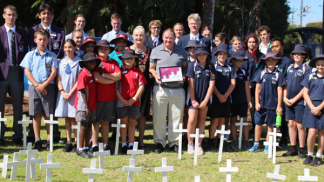 Mayor Roberts pictured with local school students, Road Safety Council Chairman Iain Cameron and Road Safety Human Spirit Award winner Rusty Nelligan.