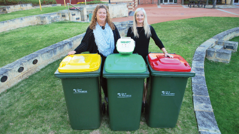 Mayor Tracey Roberts and Deputy Mayor Natalie Sangalli demonstrating how the new three-bin system will work.