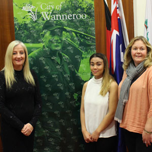 Mayor Tracey Roberts with Van Truong and Ainsley Brett-Matthewson