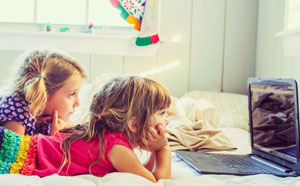 Children looking at computer