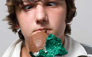 Boy eating chocolate