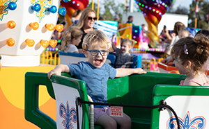 Young child on carnival ride