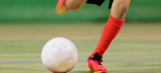 Someone playing football
