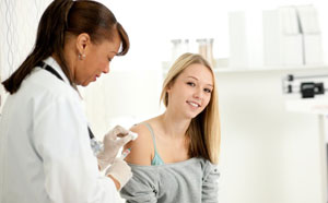 Girl getting immunisation