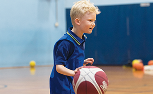 Child playing basketball