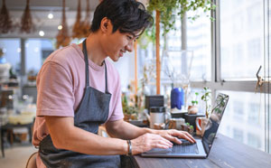 Man looking at laptop computer