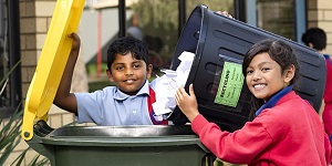 Children emptying bin