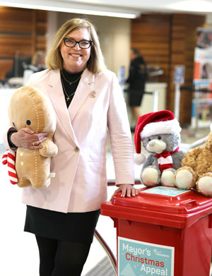 Mayor Linda Aitken with donation bin