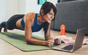 Woman exercising at home