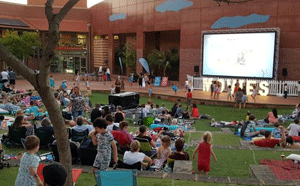 People watching movies outside