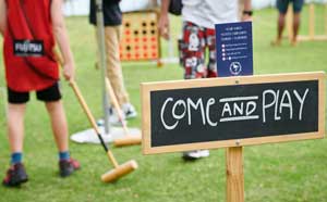 People playing croquet