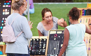 Family buying from market stall