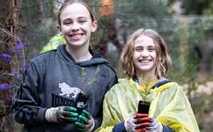 Two children planting