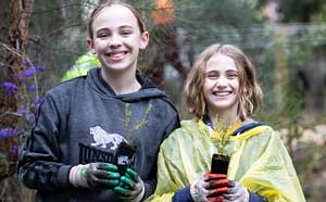 Two children planting 