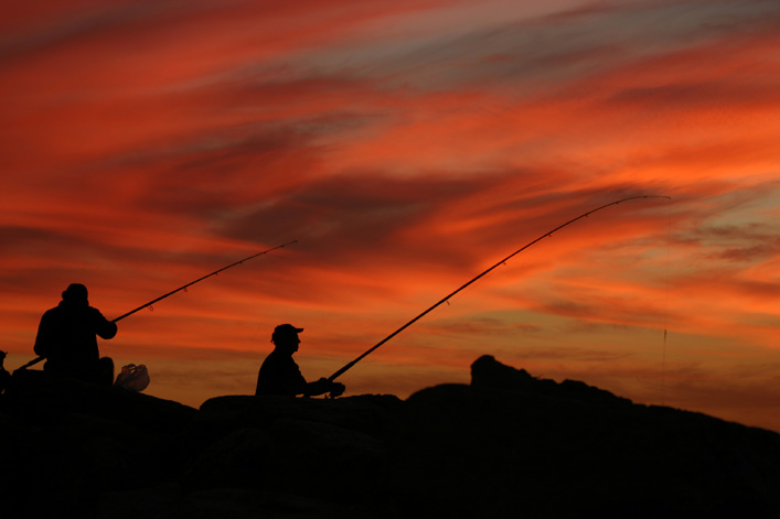 Fishermen at sunset