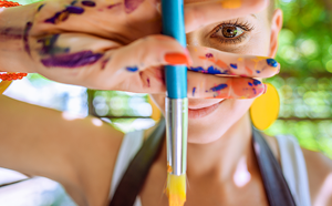 Girl with paintbrush