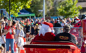 Santa takes a sleigh ride through the Wanneroo Town Centre for the City of Wanneroo Christmas Fiesta