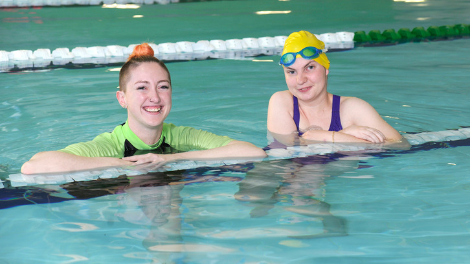 Dolphins Program swimmer Beth Langford, with Wanneroo Aquamotion swim instructor Danielle Lysle, is looking forward to the upcoming Dolphins Olympics.