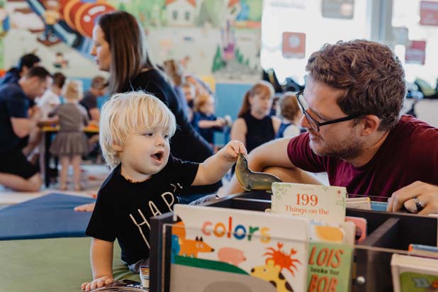 Dad and son at library