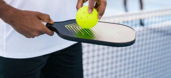 Person playing pickleball
