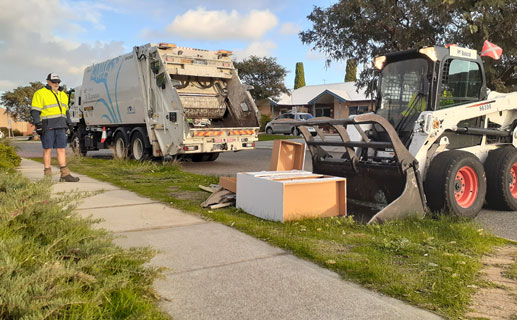 Waste being picked up from verge