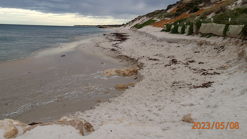 Beach showing sand erosion