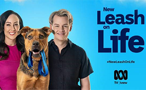 Comedian Joel Creasey and dog behaviour expert Laura V with a dog.
