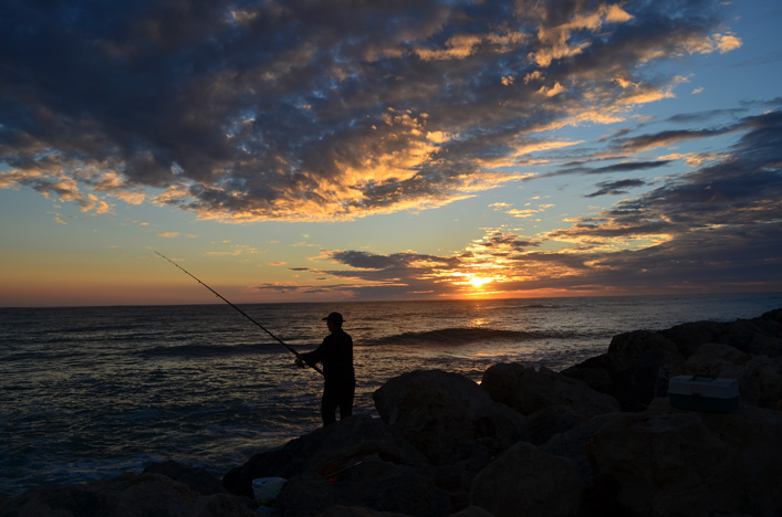 Fisherman at sunset