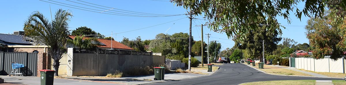 View of street with power poles