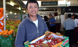 Man with fruit produce