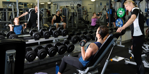Woman exercising with weights