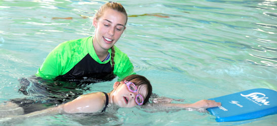 Child learning to swim