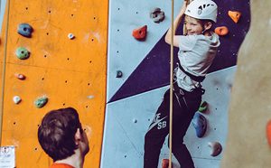 Child climbing wall