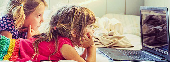 children looking at screen