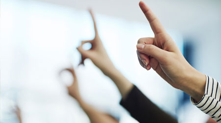 People raising their hands