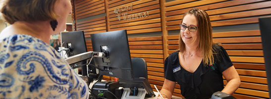 Customer and staff member at the City of Wanneroo Civic Centre