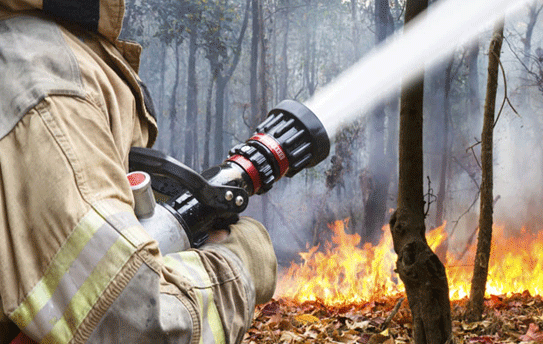 Fireman fighting fire