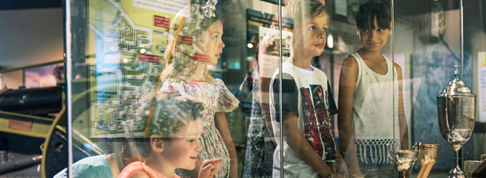 Children viewing objects in a museum