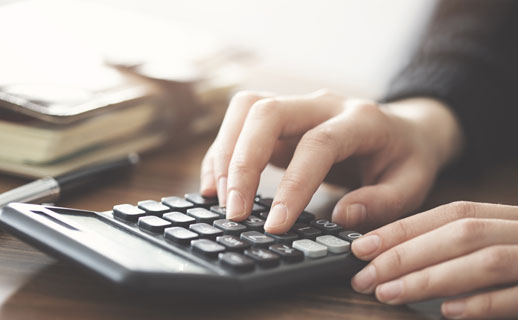 Woman using a calculator