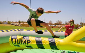 Child jumping on inflatable