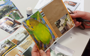 Making a journal with junk mail. 