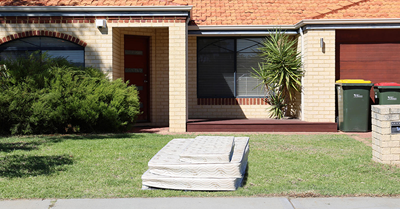 Mattress on verge for collection