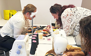 People using sewing machines 
