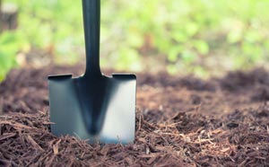 Image of mulch and spade.