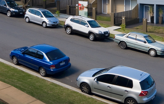 Cars parked on road