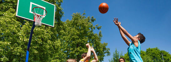 Children playing basketball