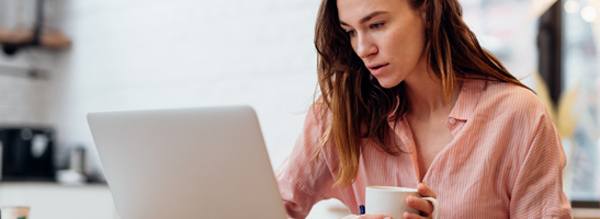 Woman reading a computer screen